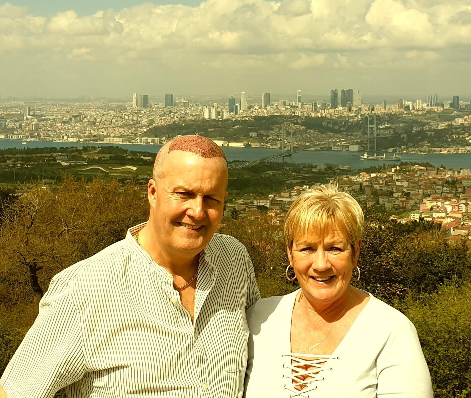 A patient and his wife above the Bosphorus the day after his procedure