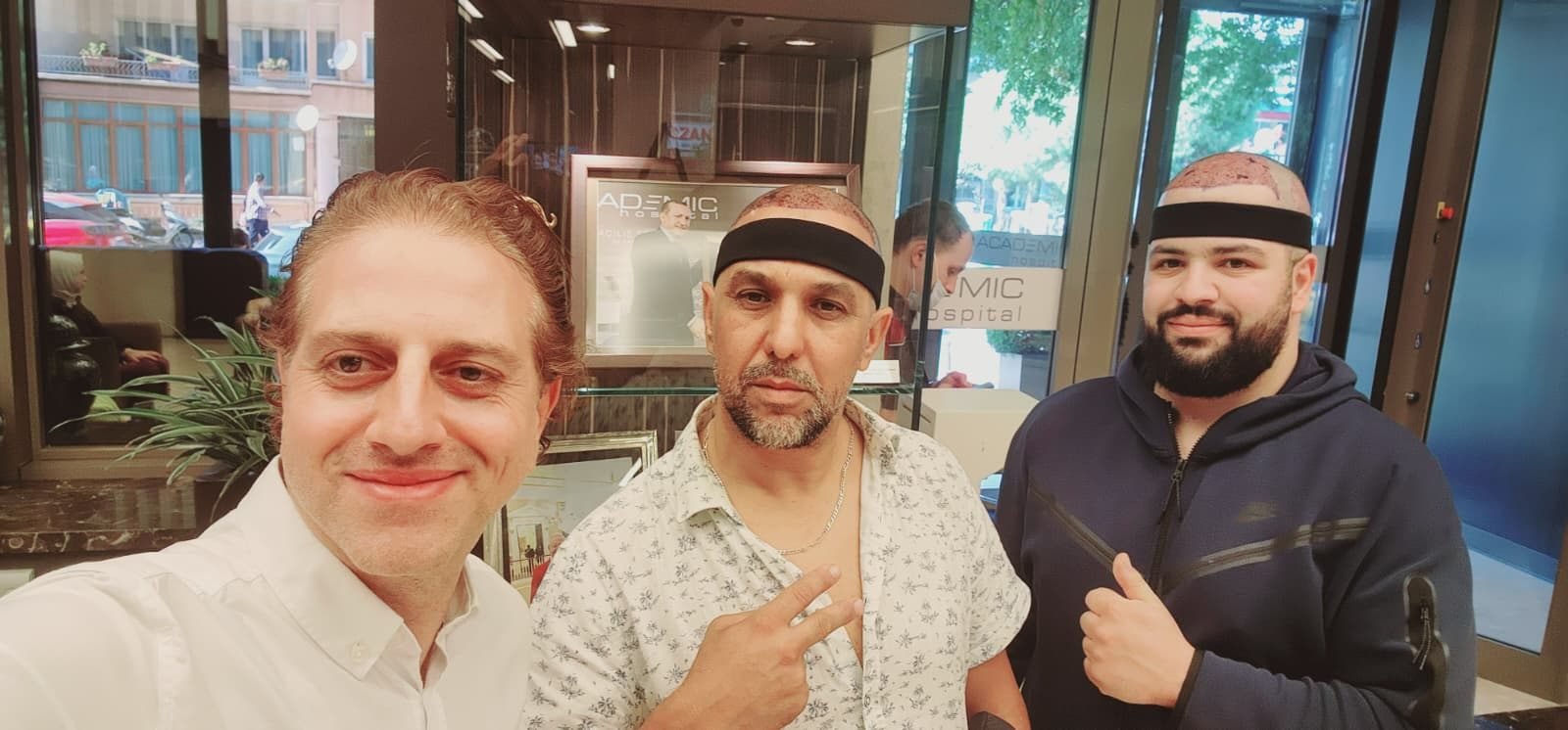 Patients with their coordinator in the lobby